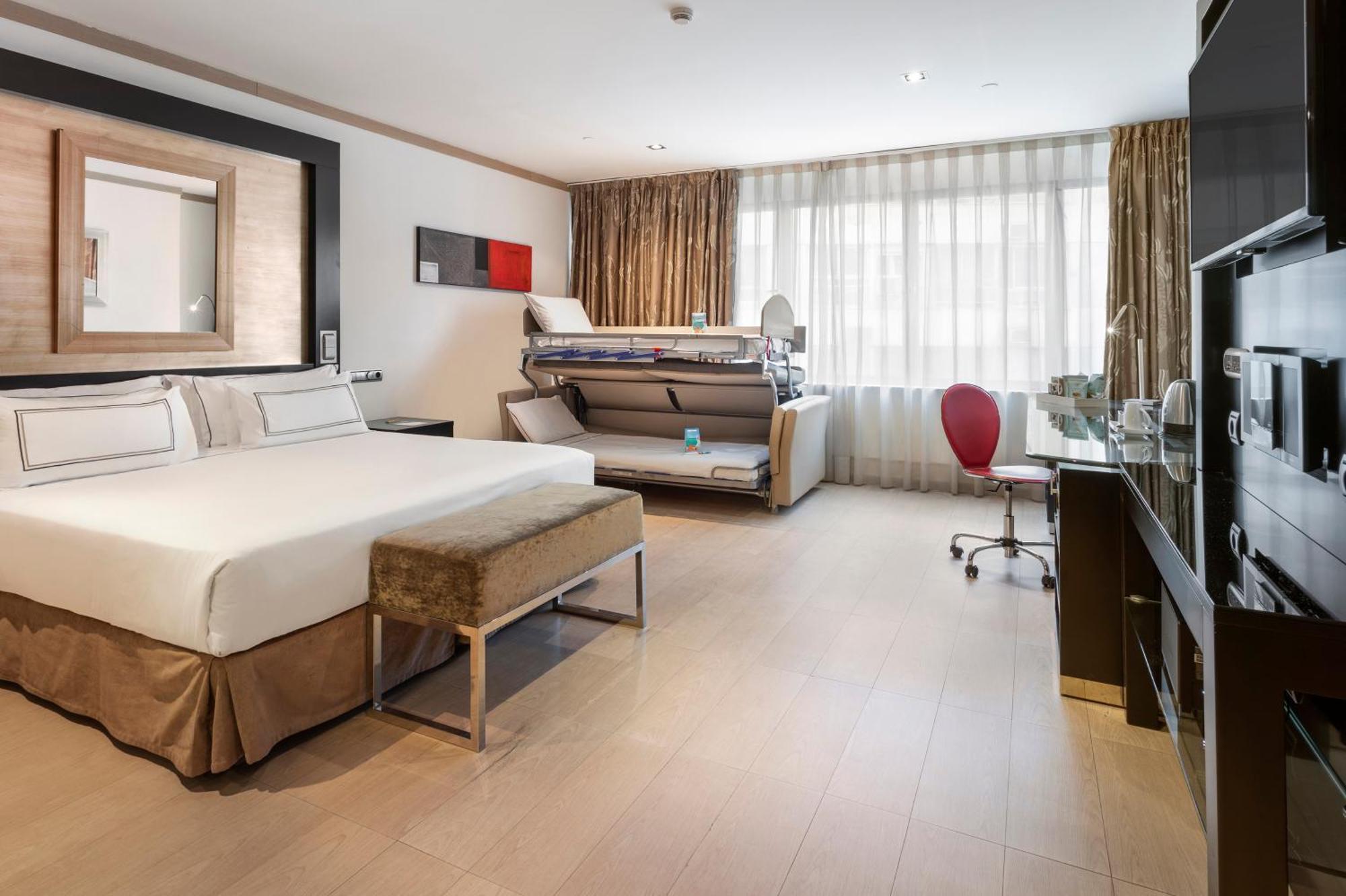 Melia Madrid Princesa ภายนอก รูปภาพ A room at the hotel